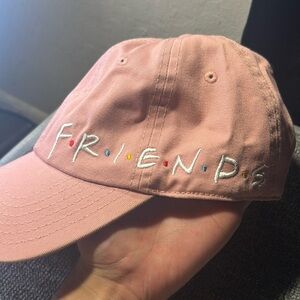 Pink hat with tv show “Friends” on the side